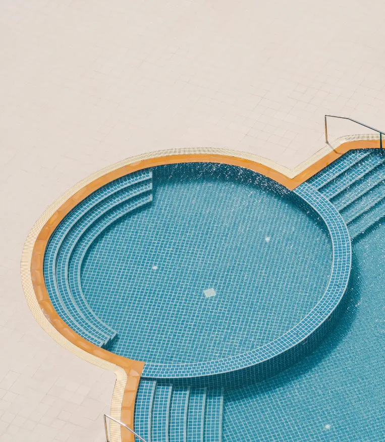 Dallas Pools Contractor - Modern backyard pool with spa and water features